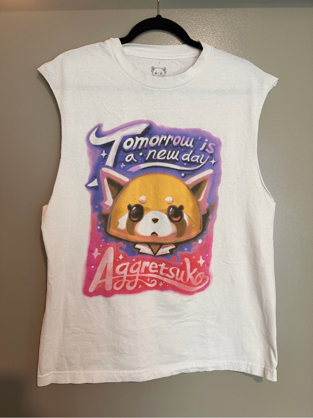 Sanrio White Muscle Tee with Pink, Purple & Yellow Aggretsuko Graphic